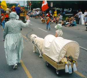 Rear view of Blossom pulling the wagon.  With her are Colette and Danica (6).